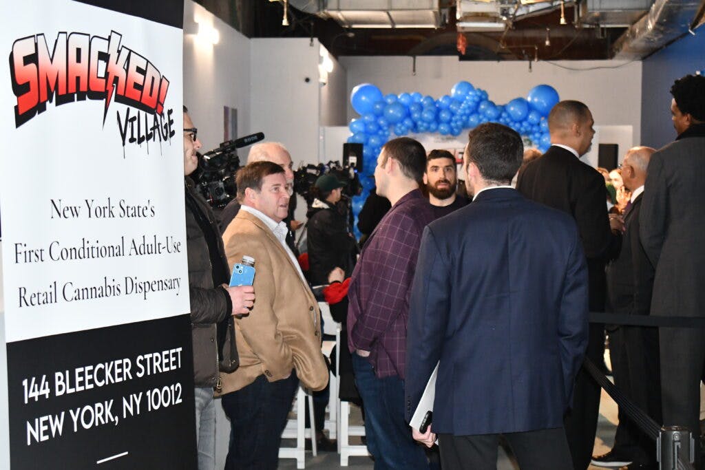 Inside New York's second legal weed store, Smacked Village on Bleecker Street, press and industry players gathered to celebrate history. (Calvin Stovall / Leafly)